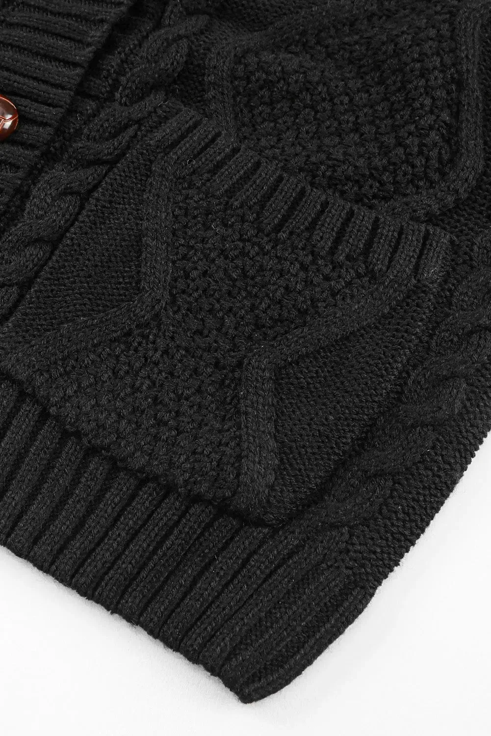 Elegant Textured Black Cardigan with Practical Pockets and Button Front