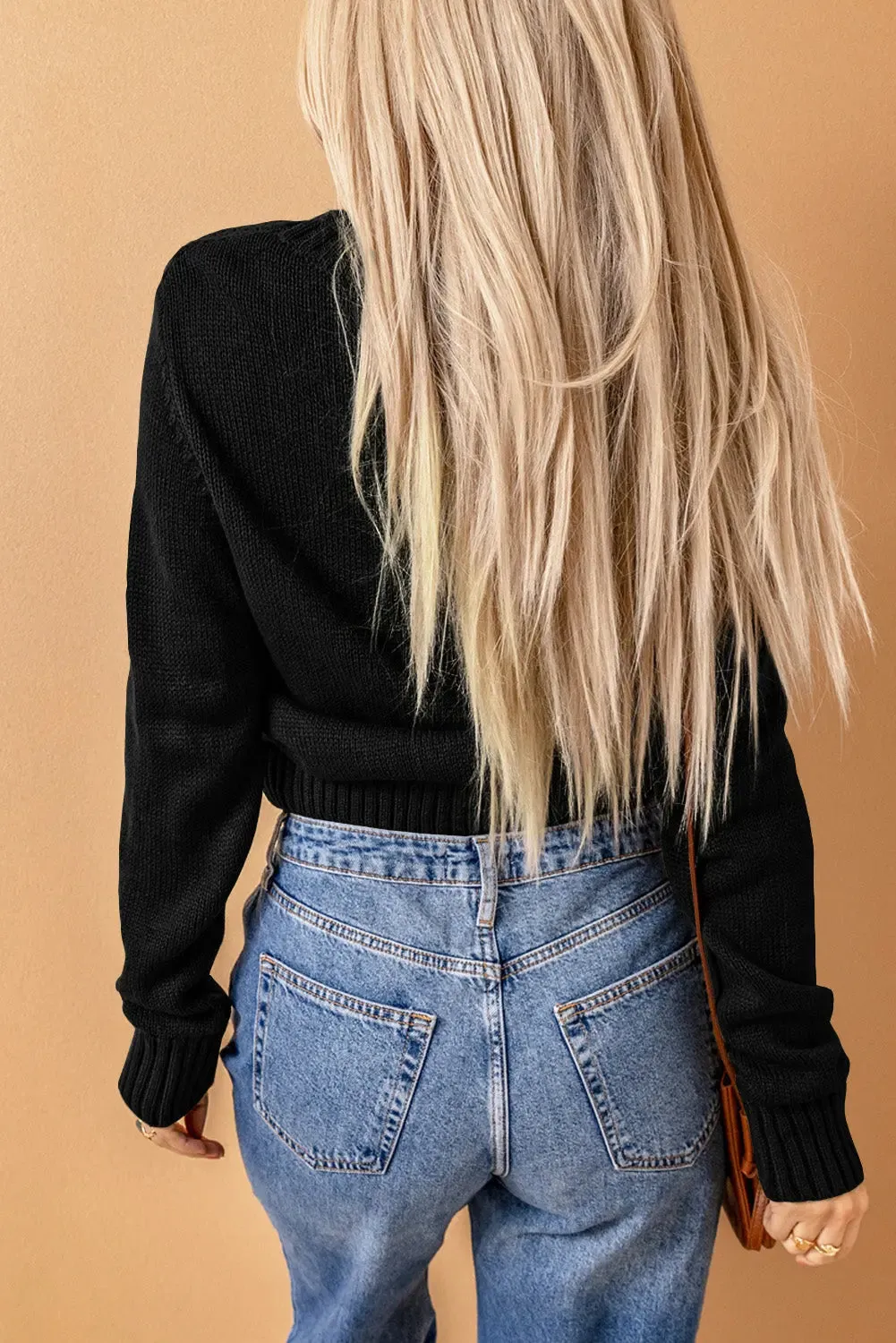 Elegant Textured Black Cardigan with Practical Pockets and Button Front