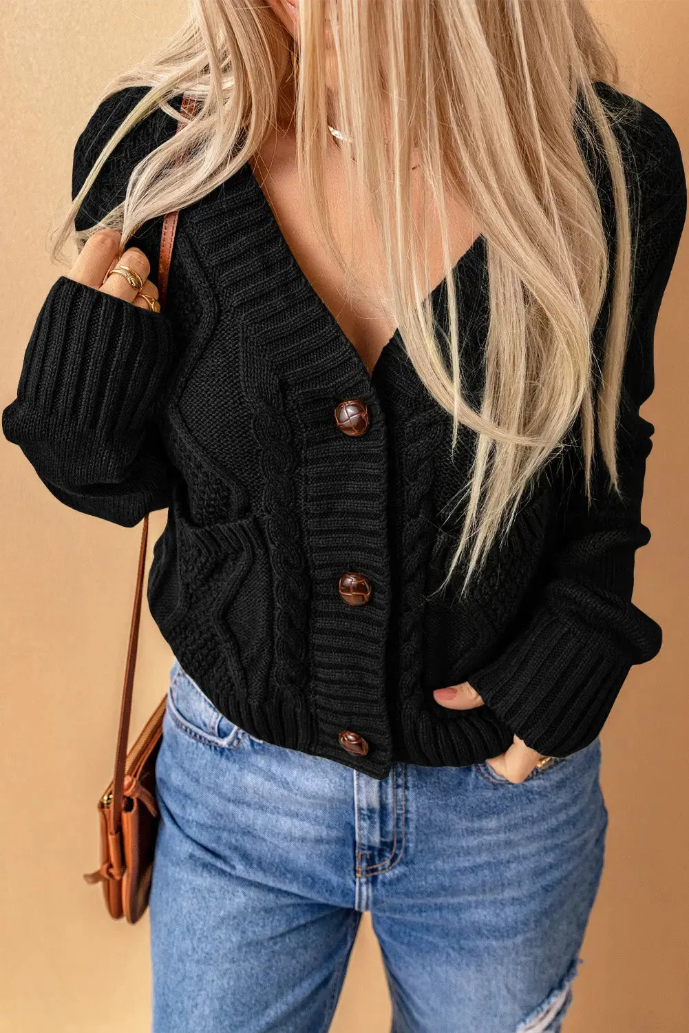 Elegant Textured Black Cardigan with Practical Pockets and Button Front